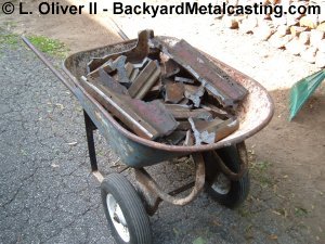 iron scraps in a wheelbarrel