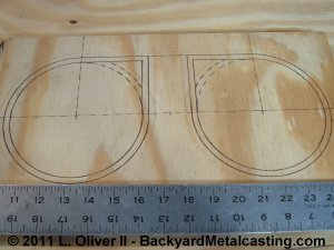 The blower outline drawn on 3/4 plywood